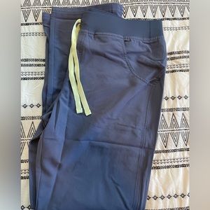 Woman’s space navy kade cargo scrub pants. Never worn. New with tags